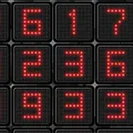 Màn hình hiển thị các số đèn LED đỏ trên nền đen xếp thành lưới
