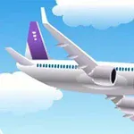Máy bay đang bay trên bầu trời xanh với mây xung quanh