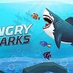 Cá mập hung dữ đang bơi dưới biển cùng với các loài cá khác và một con tàu đắm mờ nhạt ở phía xa