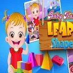 Hình ảnh bé gái tóc vàng vui vẻ với các hình khối màu sắc và bảng hiệu Learn Shapes