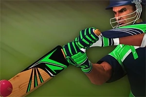 Một vận động viên cricket đang đánh bóng với gậy cricket, mặc trang phục màu xanh lá và xanh dương, đội mũ bảo hiểm