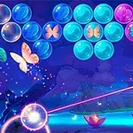 Hình ảnh có các bong bóng màu xanh, tím và bươm bướm nhiều màu sắc bay lượn trên nền cảnh đêm với hoa súng