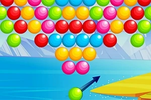 Một mũi tên xanh hướng về phía các quả bóng màu sắc khác nhau xếp thành hàng trên nền có phong cảnh nước biển