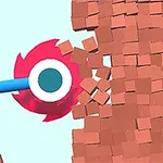 Lưỡi cưa đang phá vỡ bức tường gạch màu nâu