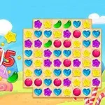 Hình ảnh hiển thị bảng ghép kẹo nhiều màu sắc với nền bầu trời xanh và kẹo xung quanh