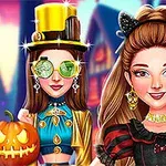 Hai cô gái trong trang phục Halloween với nền bí ngô và mạng nhện