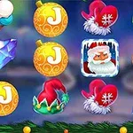 Hình ảnh có các quả cầu trang trí màu vàng, nút áo đỏ, chữ cái, viên pha lê xanh, mũ ông già Noel và biểu tượng ông già Noel