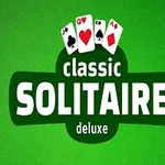 Hình ảnh nền xanh với bốn quân bài và dòng chữ classic SOLITAIRE deluxe