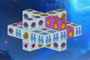 Hình ảnh hiển thị một mô hình khối lập phương được trang trí bằng các biểu tượng như đĩa bay, người ngoài hành tinh, ngôi sao và đồng hồ cát trên nền vũ trụ xanh