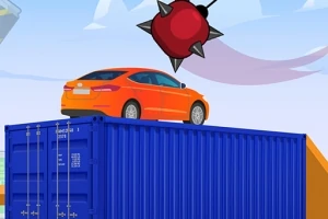 Chiếc xe màu cam đậu trên thùng container màu xanh, phía trên là quả cầu gai lớn màu đỏ lơ lửng