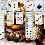 Bộ bài xếp thành hàng trên nền hình ảnh hoa và bánh ngọt