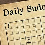 Một bảng Sudoku với tiêu đề Daily Sudoku và một chiếc bút lông ở góc bàn