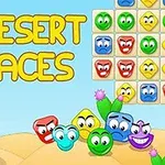 Các khuôn mặt hoạt hình đầy màu sắc nằm trên nền sa mạc với chữ Desert Faces