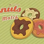 Ba chiếc bánh donut với các lớp phủ sô-cô-la khác nhau nằm trên nền kẻ sọc xanh