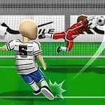 Một cầu thủ đang sút bóng về phía khung thành, với một thủ môn đang nhảy để cản phá bóng