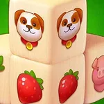 Các khối gỗ với hình vẽ động vật và hoa quả gồm chó, lợn, cà rốt và dâu tây trên nền xanh lá cây