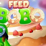 Hình ảnh có một sinh vật xanh đội kính, kèm theo chữ Bobo tạo hình từ bánh donut, phía sau là bánh kem trái cây với viền trời màu hồng xanh