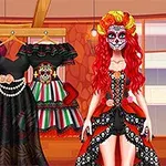 Người phụ nữ tóc đỏ đeo mặt nạ trang trí hoa văn, đứng cạnh ba bộ váy màu sắc khác nhau treo trên kệ