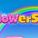 Chữ flowers nhiều màu sắc với cầu vồng phía sau trên nền bầu trời xanh