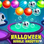 Đồ họa với các quả bóng màu sắc, hộp sọ và từ Halloween Bubble Shooter ở phía dưới