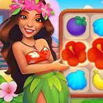 Người phụ nữ mặc trang phục truyền thống Hawaii đang đứng bên cạnh bảng ghép hình với các biểu tượng trái cây và hoa