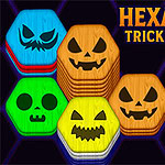 Hexa Sort Trick or Treat Các khối lục giác nhiều màu sắc có hình mặt bí ngô và mặt nạ ma cùng với ngón tay hình xương chỉ vào dòng chữ Hexa Sort Trick or Treat