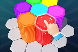 Một bàn tay đang chạm vào khối lục giác màu đỏ trong đống các khối lục giác màu sắc khác nhau