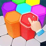 Một bàn tay đang chạm vào khối lục giác màu đỏ trong đống các khối lục giác màu sắc khác nhau