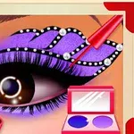 Trang điểm mắt sáng tạo với phấn mắt màu tím, chi tiết kim cương và cọ trang điểm, kèm theo hộp phấn và bột trang điểm bên cạnh