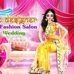 Người phụ nữ mặc sari vàng lấp lánh ngồi trên ghế sofa trong không gian trang trí với rèm màu hồng và dòng chữ lớn