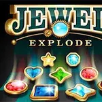 Chữ JEWEL EXPLODE màu vàng nổi bật trên nền đen với các viên đá quý nhiều màu sắc bên dưới