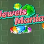 Chữ Jewels Mania màu hồng nổi bật với các viên đá quý nhiều màu sắc xung quanh trên nền xanh lá