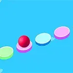 Một quả bóng đỏ đang di chuyển trên các nền tròn nhiều màu sắc trên nền trời xanh