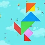Các hình khối nhiều màu sắc xếp chồng lên nhau trên nền bầu trời xanh với mây và những mảnh giấy bay