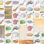 Các ô vuông chứa hình ảnh đồ vật nhà bếp như cốc, ấm trà, bát, chảo và dao được sắp xếp thành lưới
