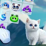 Một chú mèo trắng nhỏ dễ thương đứng bên cạnh một bảng với các biểu tượng động vật đầy màu sắc và một bàn tay chỉ vào biểu tượng