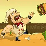 Một người đàn ông cơ bắp đang bắt một chiếc hamburger lớn trong sa mạc với một người lớn tuổi cầm gậy đứng cạnh đường ray xe lửa, cùng với vài cây xương rồng ở xung quanh