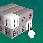 Khối lập phương được tạo từ các ô vuông có họa tiết hoa và ký hiệu, với bàn tay chỉ vào một ô trên nền xanh