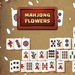 Các khối gạch Mahjong được sắp xếp trên nền có viền hoa anh đào và bảng hiệu Mahjong Flowers