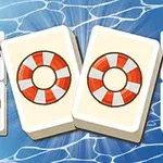 Hai khối domino với hình phao cứu hộ nổi bật ở trung tâm, xung quanh là các khối có hình ảnh chủ đề mùa hè như cây cọ, địa cầu, và bóng bãi biển, trên nền xanh sóng nước
