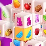 Hình ảnh khối lập phương xếp chồng với các biểu tượng trái cây và kẹo đầy màu sắc nổi bật trên nền tím