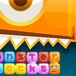 Hình ảnh một khối hình dạng quái vật màu cam với răng nhọn bên dưới và chữ monster blocks đầy màu sắc bên dưới
