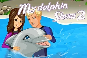 Hai người trẻ vui vẻ cùng một chú cá heo trong bể bơi với chữ My Dolphin Show 2 ở trên
