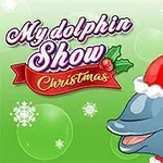 Chú cá heo đội mũ ông già Noel trên nền xanh với bông tuyết rơi