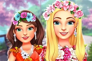 Hai cô gái với vòng hoa trên đầu và trang phục sặc sỡ đứng cạnh nhau với nền là cảnh thiên nhiên