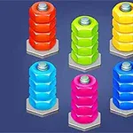 Các cọc ốc vít nhiều màu sắc trên nền màu xanh lam