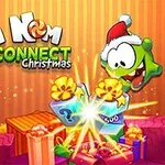 Một sinh vật màu xanh đội mũ ông già Noel, xung quanh là các hộp quà nhiều màu sắc và dòng chữ Om Nom Connect Christmas nổi bật