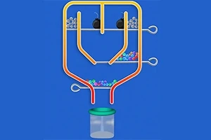 Hình ảnh cho thấy một cấu trúc với các quả bóng màu và bom nằm trong các ống dẫn, có thể di chuyển bằng cách tháo chốt, bên dưới có một hộp chứa