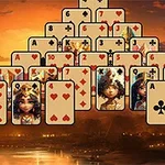 Hình ảnh là một kim tự tháp các lá bài chơi đặt trên nền hoàng hôn với cảnh sông nước và bóng cây ở xa