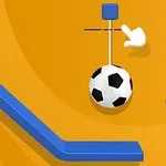 Một quả bóng đá treo trên sợi dây với nền màu cam và các thanh chắn màu xanh